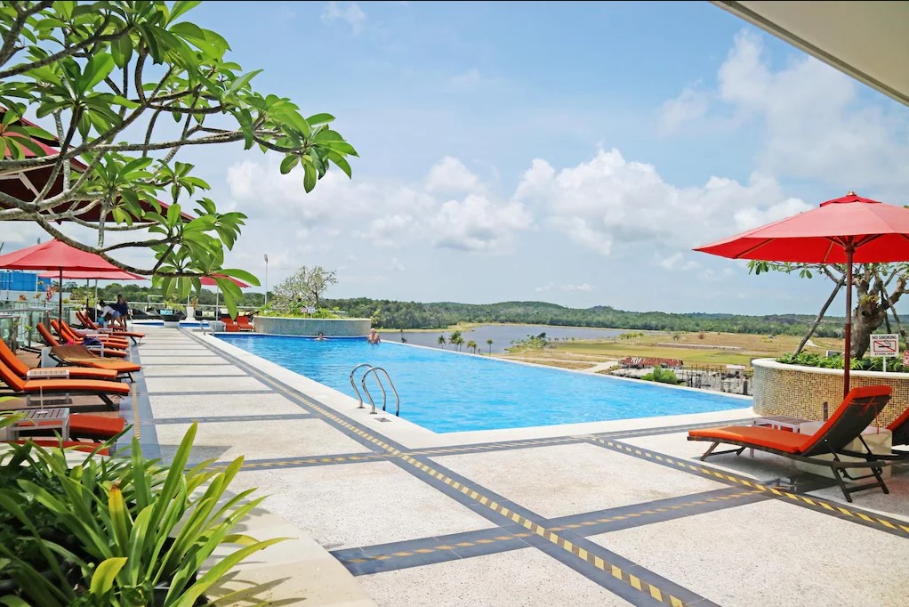Golfers enjoying Laguna Golf Bintan and Ria Bintan Golf Club with accommodation at Grand Lagoi Hotel