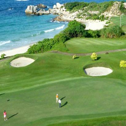 View of Bintan Lagoon Golf Course with lush fairways surrounded by tropical landscapes in Bintan