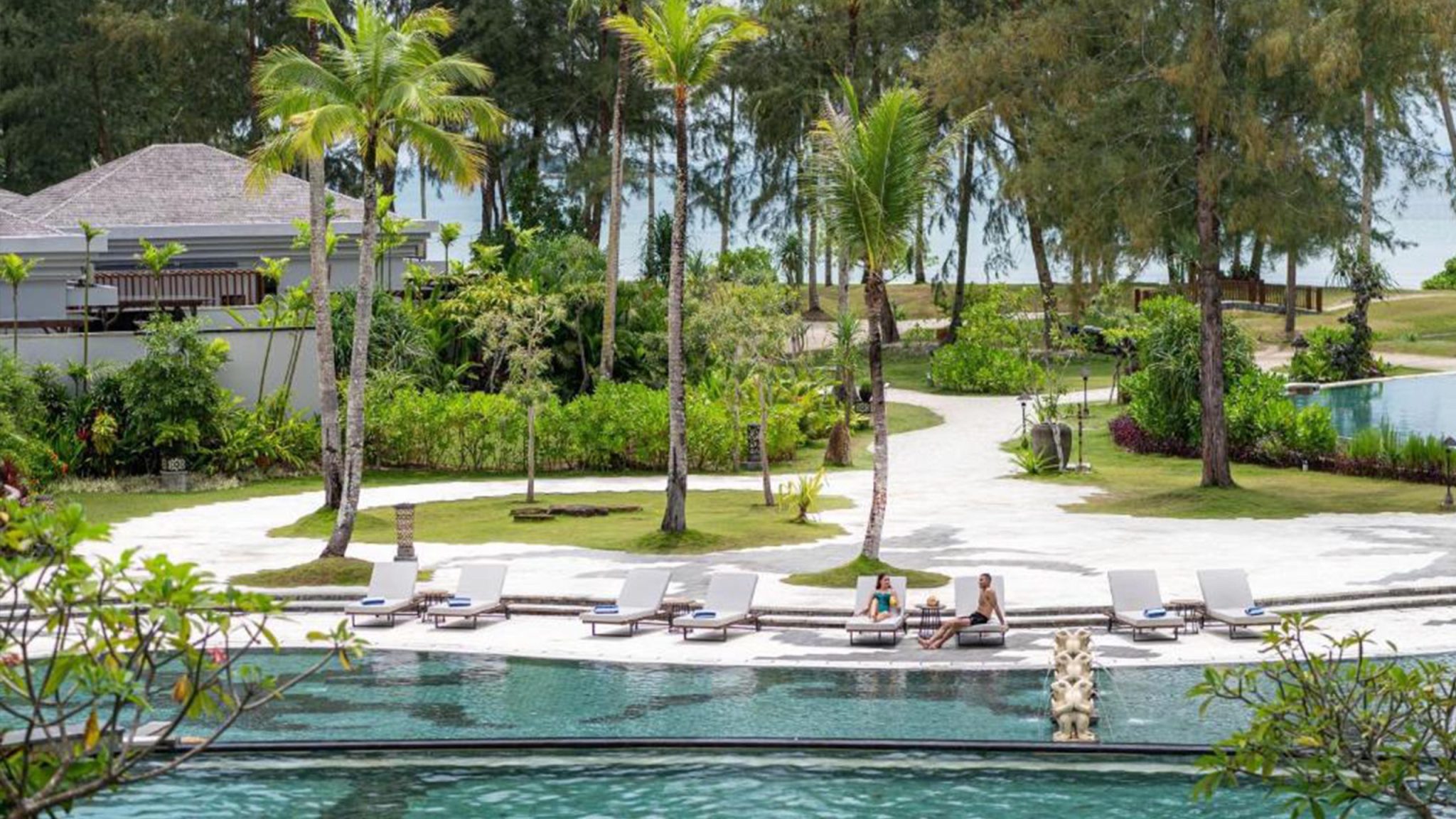 Golfers at Ria Bintan Golf Club with Four Points Bintan weekday golf package