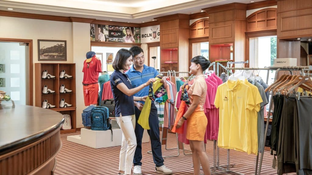 Interior view of Ria Bintan Golf Club clubhouse and pro shop with tropical surroundings